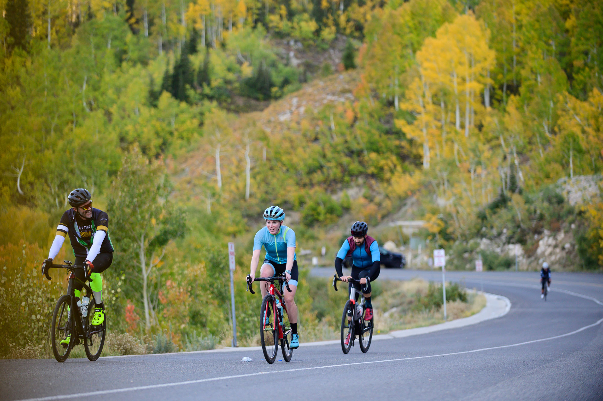 four riders on road bikes