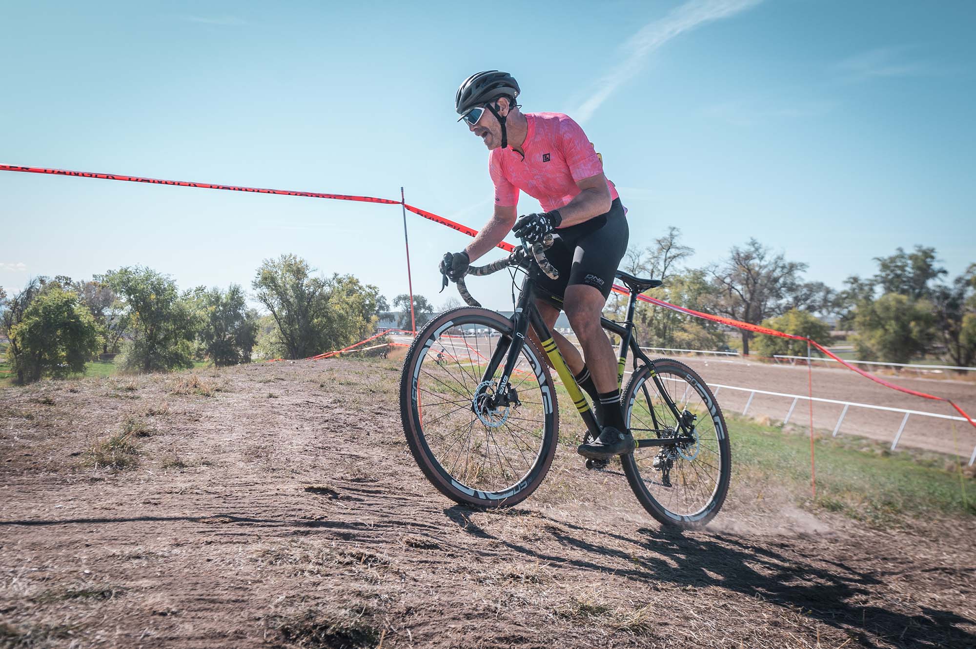 cyclocross racer wearing custom dna skin suit
