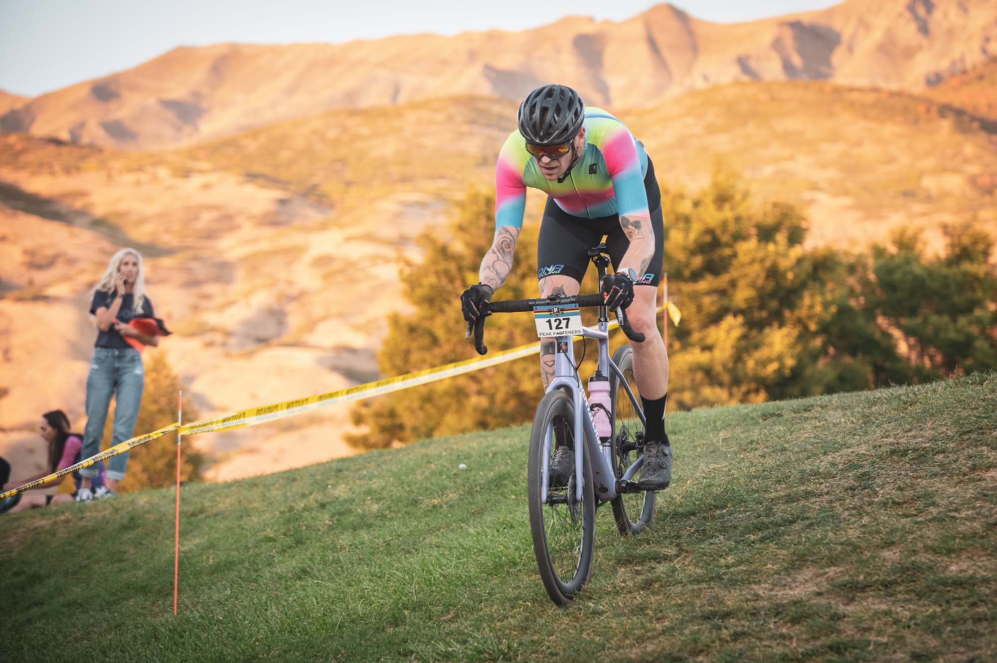 todd riding his bike down a grassy hill